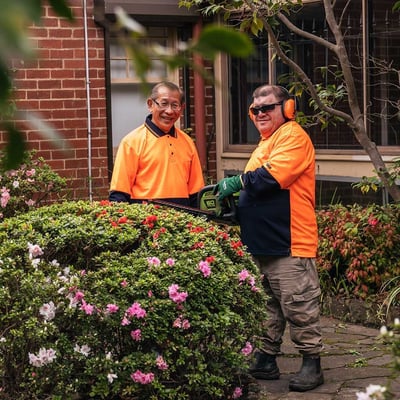 Two men in a garden